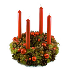 Christmas wreath with red candles isolated on white background