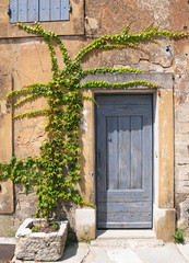 Entry to old tenement house in Gordes,  Provence in France