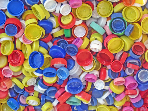 recycling of a collection of colored plastic caps for bottles