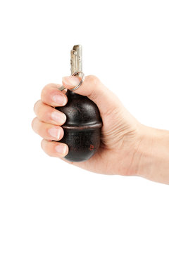 old hand grenade in hand