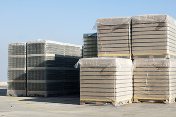 Pallets of empty glass jars