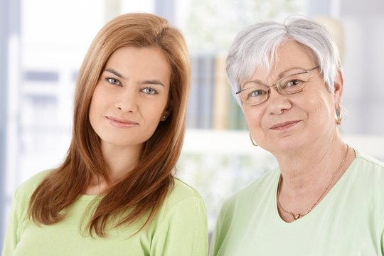 Closeup portrait of senior mother and daughter
