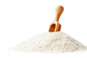 White rice and wooden spoon