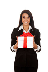 Smiling business woman standing with folded hands