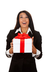 Fototapeta premium Smiling business woman standing with folded hands