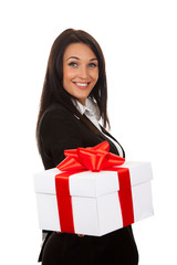 Smiling business woman standing with folded hands