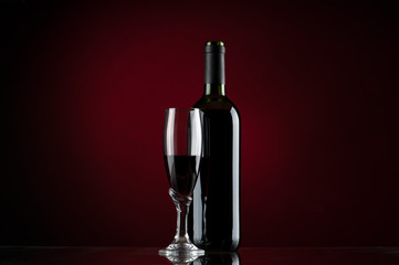 Bottle and glass of red wine