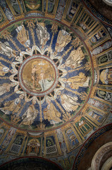 Fototapeta na wymiar Mosaic interior of Dome in Romansque Church in Ravenna Italy