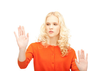 Fototapeta premium businesswoman working with something imaginary