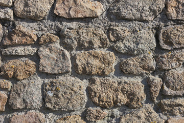 Granite stone wall close-up