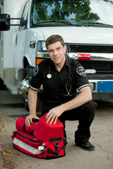 Paramedic with Portable Oxygen Unit