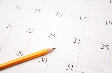 Pencil on calendar page - Powered by Adobe