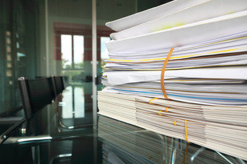 stack of documents or files in office desk