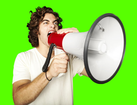 man with megaphone over removable chroma key background