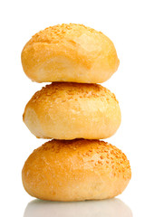 delicious buns with sesame seeds isolated on white