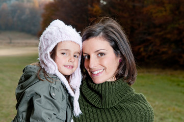 Obraz premium Happy mother and daughter in nature