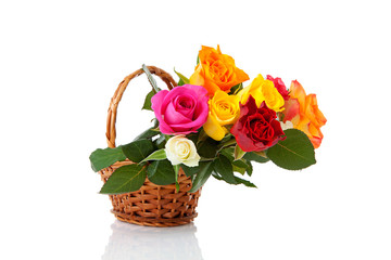 Fototapeta na wymiar cane basket with colorful roses
