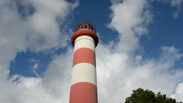 lighthouse fragment and sky clouds