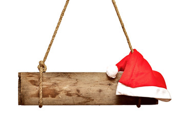 old signboard with Santa's hat isolated on a white background