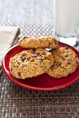 Chocolate chip oatmeal cookies and a glass of milk