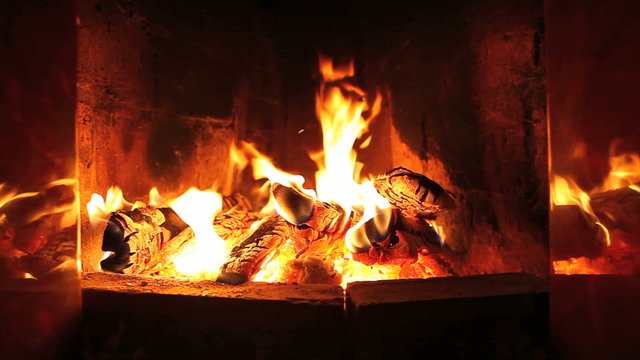 the dying embers in the fireplace