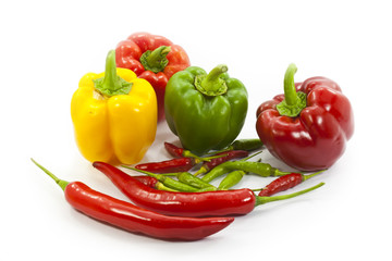 variety of peppers on white background