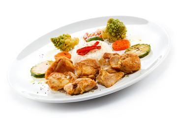 Fried chicken nuggets, white rice and vegetables