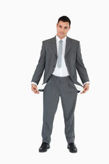 Businessman with empty pockets