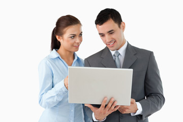 Business partners using laptop