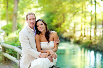 Naklejka premium couple of lovers in love in park river hug