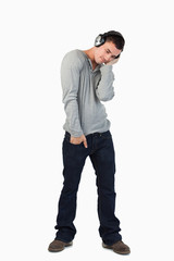 Naklejka premium Young male enjoying music