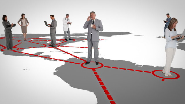 Businessmen on a map