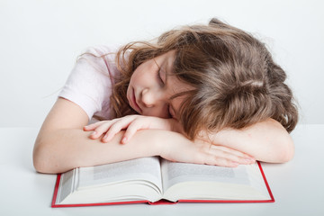 girl fell asleep with a book