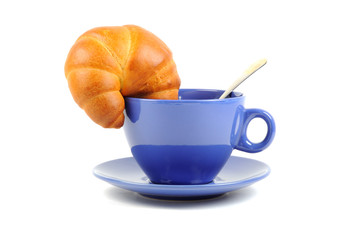 Blue  tea cup and croissant