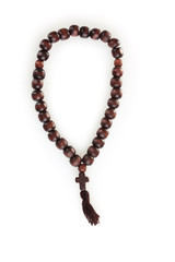 Wooden rosary isolated on white