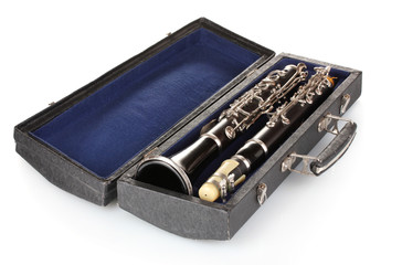 Antique clarinet in case isolated on white