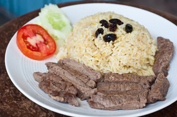 Fototapeta na wymiar rice with baked beef