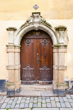 old door on street in old town Galma Stan, Stockholm, Sweden