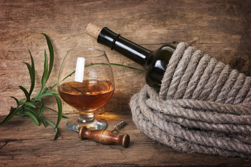 Obraz na płótnie Canvas bottle of wine wrapped with rope