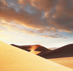 Fototapeta na wymiar Desert on sunset