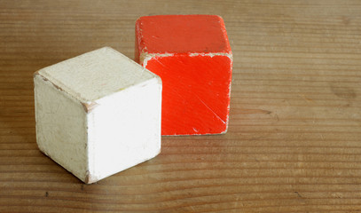 wooden cubes colored red and white