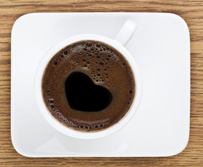Heart Shape Coffee Foam on The White Glass