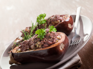 stuffed eggplants with parsley on dish