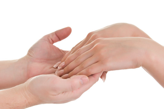 men's hands supporting women's hands