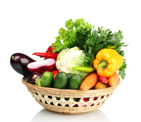 Fresh vegetables in basket isolated on white