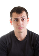 Obraz premium Puzzled young man