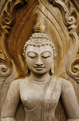 Fototapeta na wymiar Drewniany Budda.