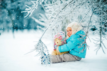 winter kid play in the fairy forest