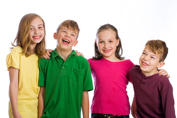 Group of happy kids with colorful shirts on