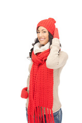 beautiful woman in hat, muffler and mittens